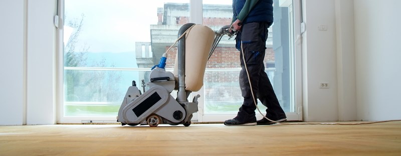 Sanding a wooden floor